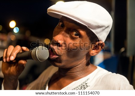 MIAMI, FL - CIRCA JULY 2012:Unidentified street performer sings in Little Havana circa July 2012 in Miami, during \