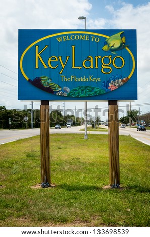 KEY LARGO, FL - CIRCA 2012: Welcome sign over the US1 in Key Largo circa 2012. The Florida Keys are a very popular tourist destination with over 2 million yearly visitors.