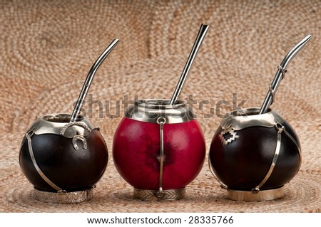 Group of calabash mate cups with straws.,Mate is a traditional drink very similar to tea in Argentina, Uruguay, Paraguay and some parts of Brazil.