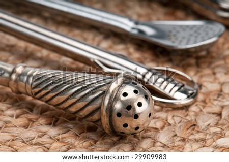 Close up of metal straws  used to drink yerba mate. Mate is a traditional drink very similar to tea in Argentina, Uruguay, Paraguay and some parts of Brazil. Use of selective focus.