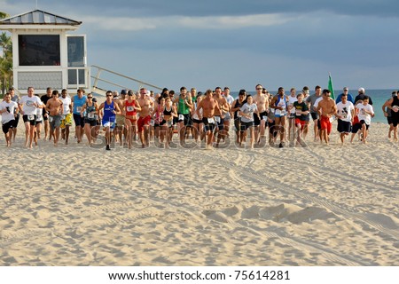 FORT LAUDERDALE, FLORIDA - APRIL 16: Competitors starts to run in the 5K Barefoot Marathon in Fort Lauderdale April 16, 2011.