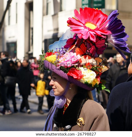 NEW YORK - MARCH 23:  A woman wears a colorful hat, during the Easter Parade on 5th Avenue, on March 23, 2008 in New York. The tradition of the Easter Parade started in the 1870\'s.