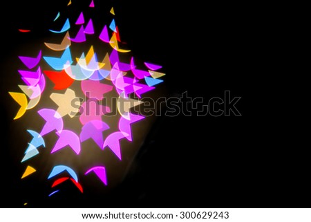 Blurred the star-shaped Bokeh black background