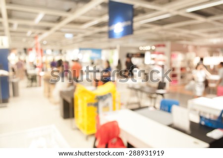 People shopping Home decor in department store. Blur store with bokeh background