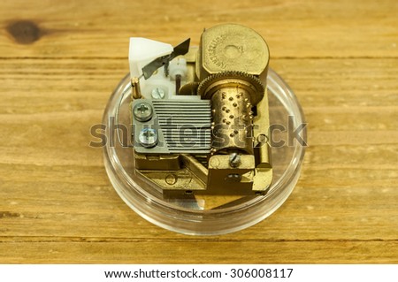 The old classic music box on wooden background