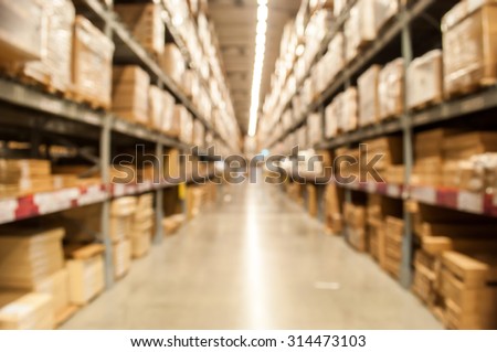 Blurred image of goods shelf in warehouse or storehouse as background