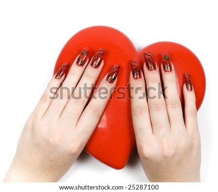 Women hands with heart and decorate manicure