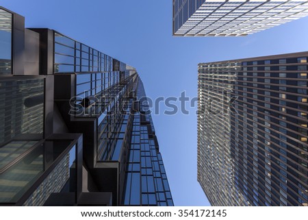 Architecture abstract. Looking up at skyscrapers and buildings in the city.