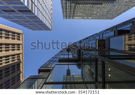 Architecture abstract. Looking up at skyscrapers and buildings in the city.