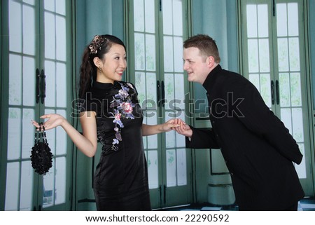 Young Couple Wearing Traditional Chinese Dress And Chinese Suit Stock