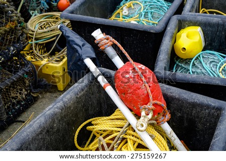 Fishing Gear in crates by trawler  at Mudeford Harbour, Dorset,UK