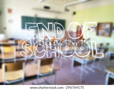 A chalk lettering with a blurred classroom in the background