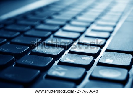 Keyboard close-up in blue shades