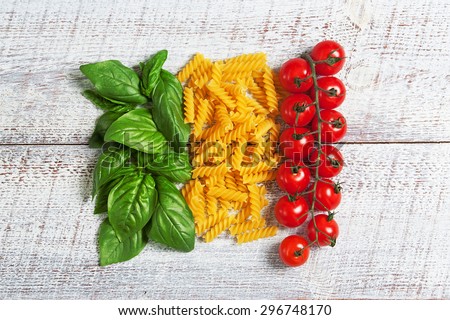 italian flag from basil pasta and tomatoes