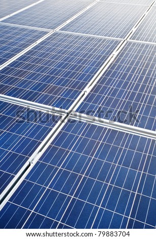 blue colored, photovoltaic solar modules for producing electricity, green energy concept texture