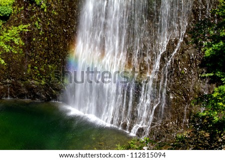 Rainbow in waterfall of Ray-Pic in France