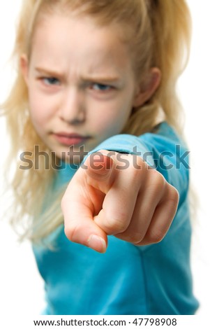 stock photo Angry girl is pointing at you finger closeup girl in blur