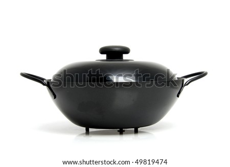 Black wok pan isolated on white background
