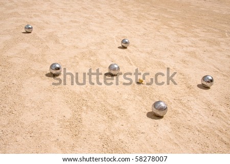 Game of jeu de boule, silvermetal  balls in sand. A french ball game