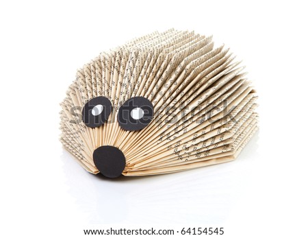 stock-photo-hedgehog-made-of-book-by-child-over-white-background-64154545.jpg