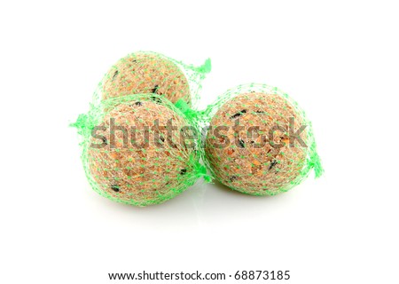 Fat balls; winter food for birds over white background