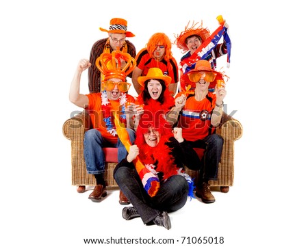 Group of Dutch soccer fan watching game over white background