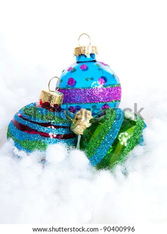 Colorful glitter Christmas balls over white background