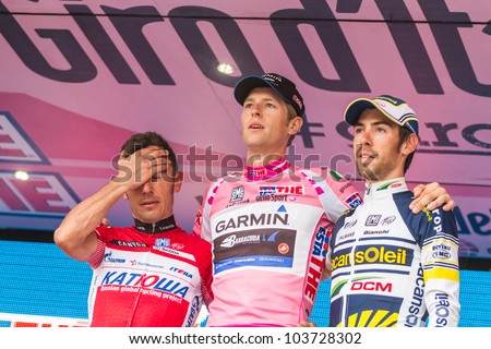 MILAN, ITALY - MAY 27: Podium of Giro d\'Italia 2012 with 1st arrived Ryder Hesjedal wearing the Pink Jersey, 2nd Joaquin Rodriguez and 3rd Thomas De Gendt on May 27, 2012 in Milano, Italy