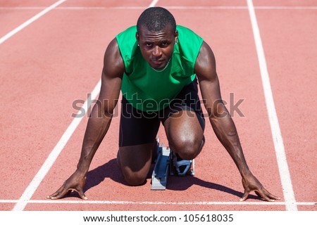 Male Track and Field Athlete before the Race Start