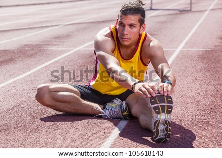 Track and Field Athlete Stretching