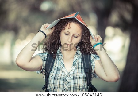 Sad Female Student at Park