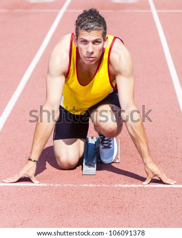 Male Track and Field Athlete before the Race Start