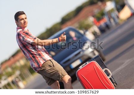Young Man Hitchhiking