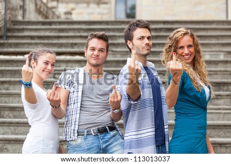 Group of Friends showing Obscene Gesture