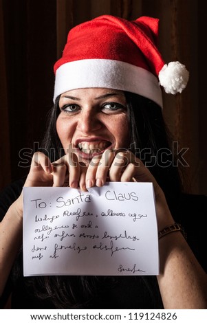 Bad Woman with Santa Hat destroying a Letter