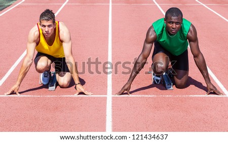 Two Track and Field Athletes before the Race Start