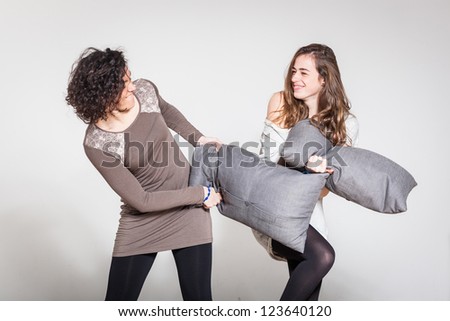 Pillow Fight between Two Beautiful Women