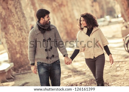 Romatic Young Couple Walking In The City