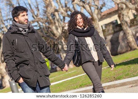 Romatic Young Couple Walking in the City