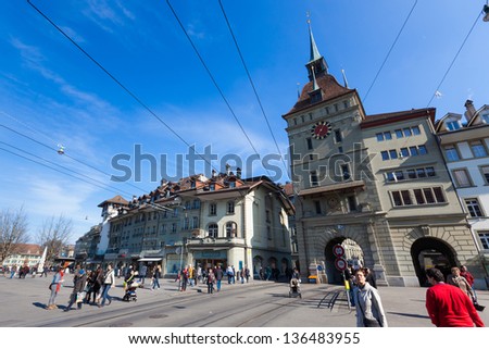 BERN, SWITZERLAND - FEBRUARY 27: People in Barenplatz on a Sunny Day on February 27, 2012 in Bern, Switzerland. Barenplatz is one of the most central and crowded square in the city.