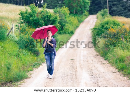 Teenage Girl with Red Umbrella