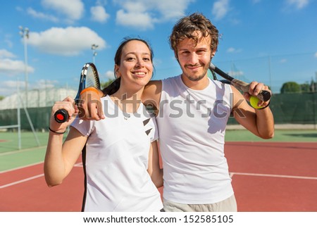 Two Happy Tennis Players