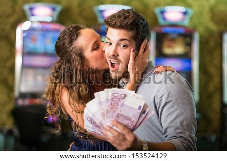 Happy Couple After Winning Money At Casino