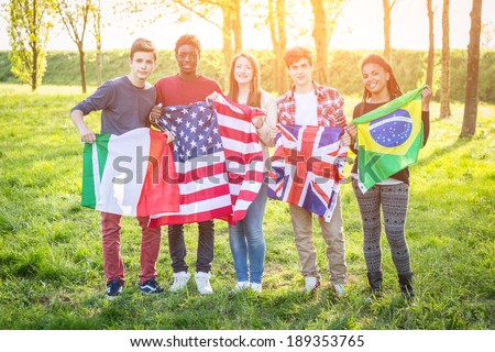 Teenage Friends Holding Flags from different Countries
