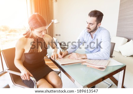 Young Woman with Financial Consultant