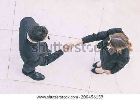 Business People Giving Handshake, Aerial View