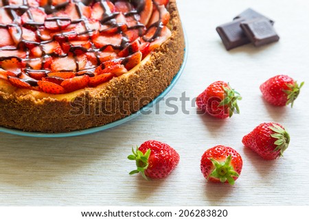 New York Cheesecake with Chocolate and Strawberries