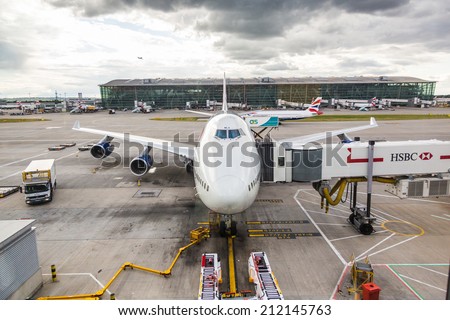 LONDON, UNITED KINGDOM - AUGUST 19, 2014: Brithis Airways Boeing 747 at London Heathrow airport with some more aircrafts on background