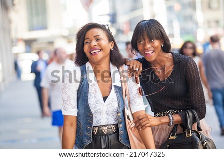 Two Beautiful Black Woman Walking in New York