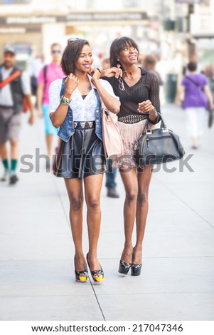 Two Beautiful Black Woman Walking in New York